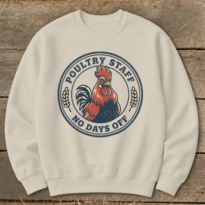Cream sweatshirt with round graphic of rooster and text "Poultry Staff No Days Off".