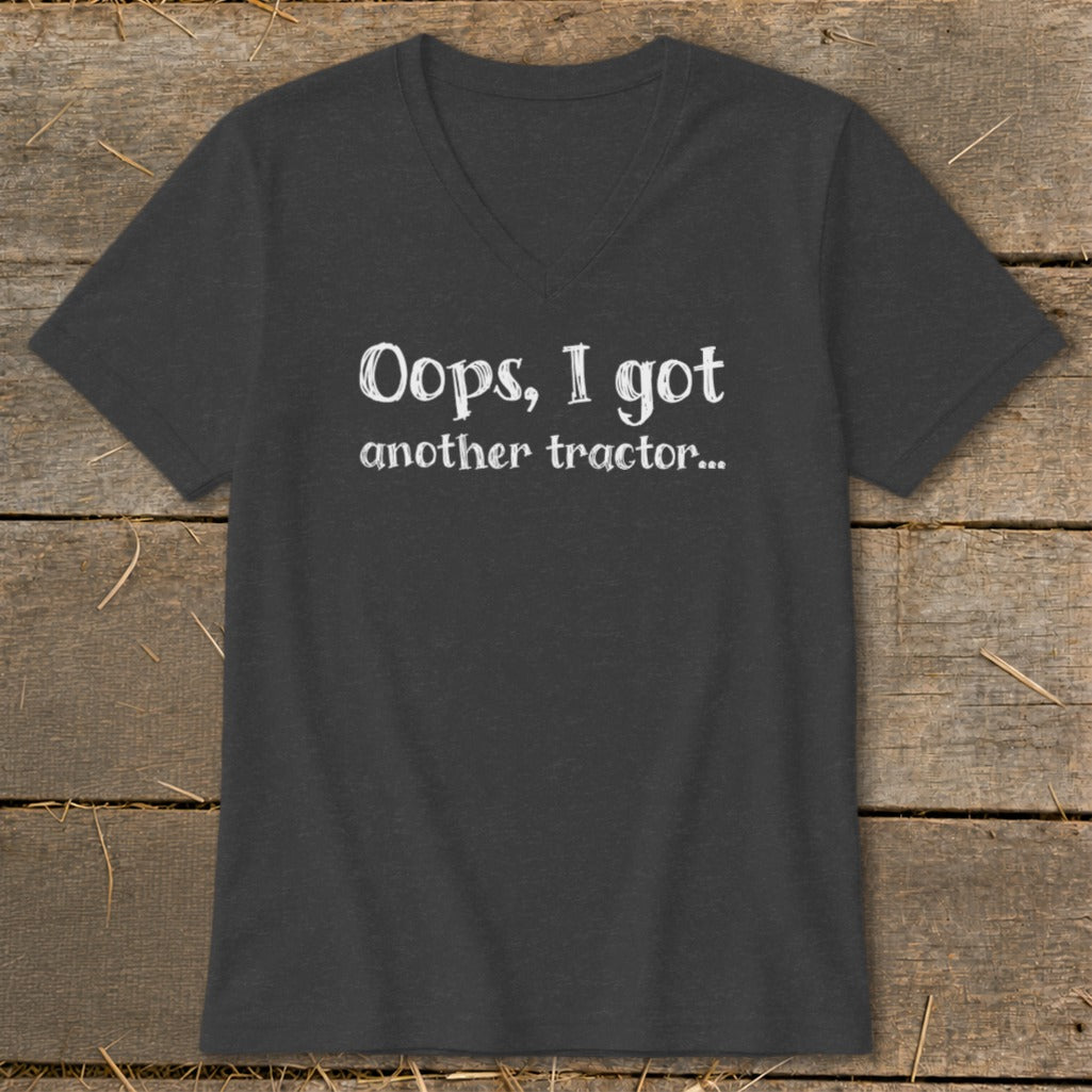 Dark gray v-neck t-shirt with white text reading "Oops, I got another tractor..."