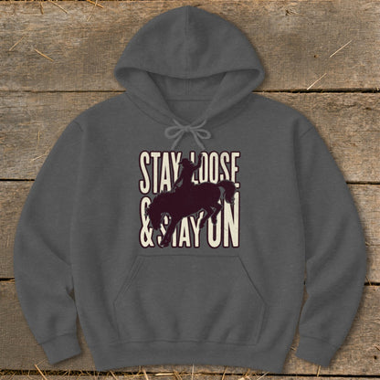 Dark grey hoodie with "STAY LOOSE & STAY ON" text and rodeo rider silhouette.