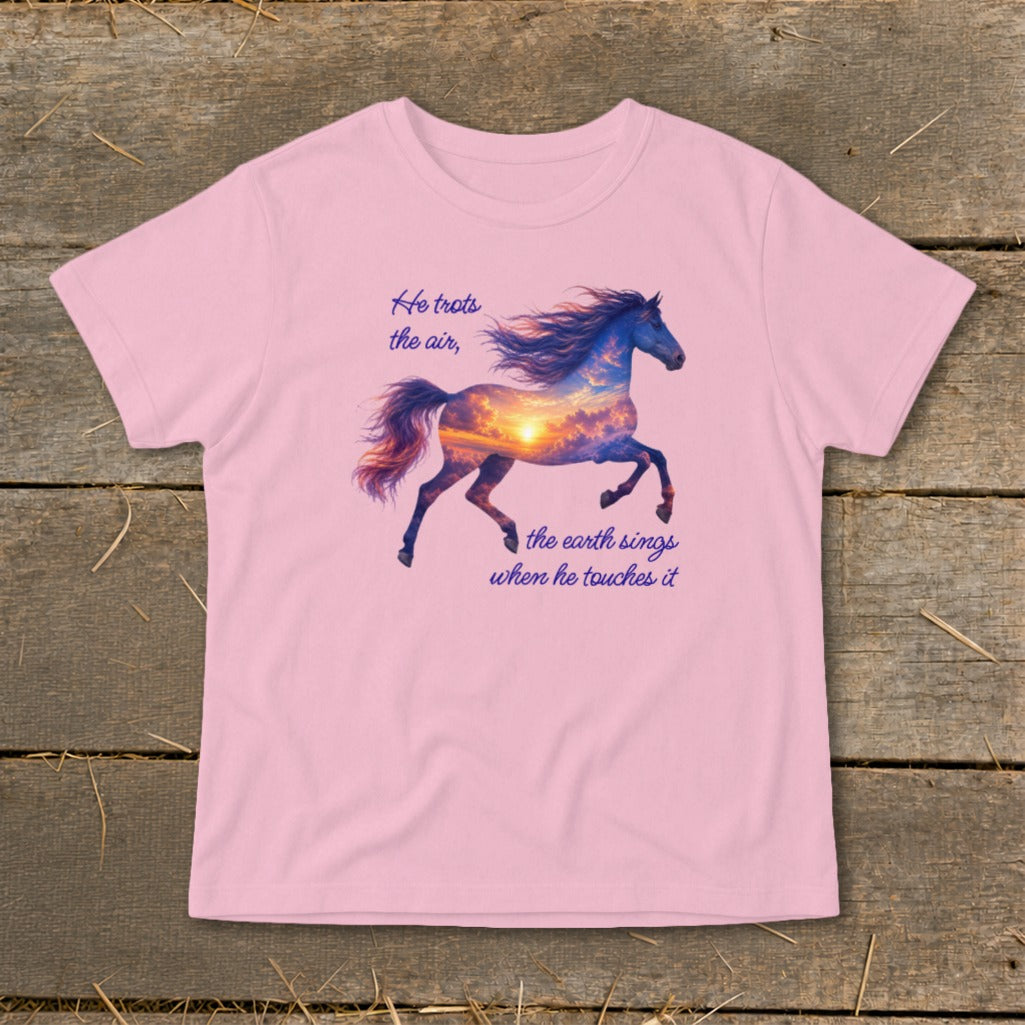 Pink t-shirt featuring a galloping horse graphic with a sunset cloud body and text reading He trots the air.