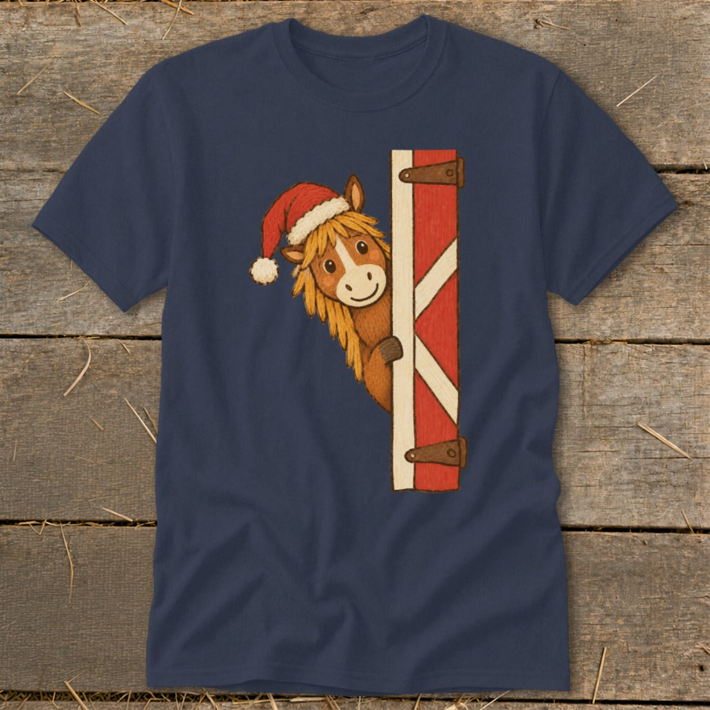 Horse with Santa hat peeking from behind a barn door.