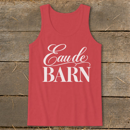 Red tank top with white "Eaude BARN" text on wooden background.