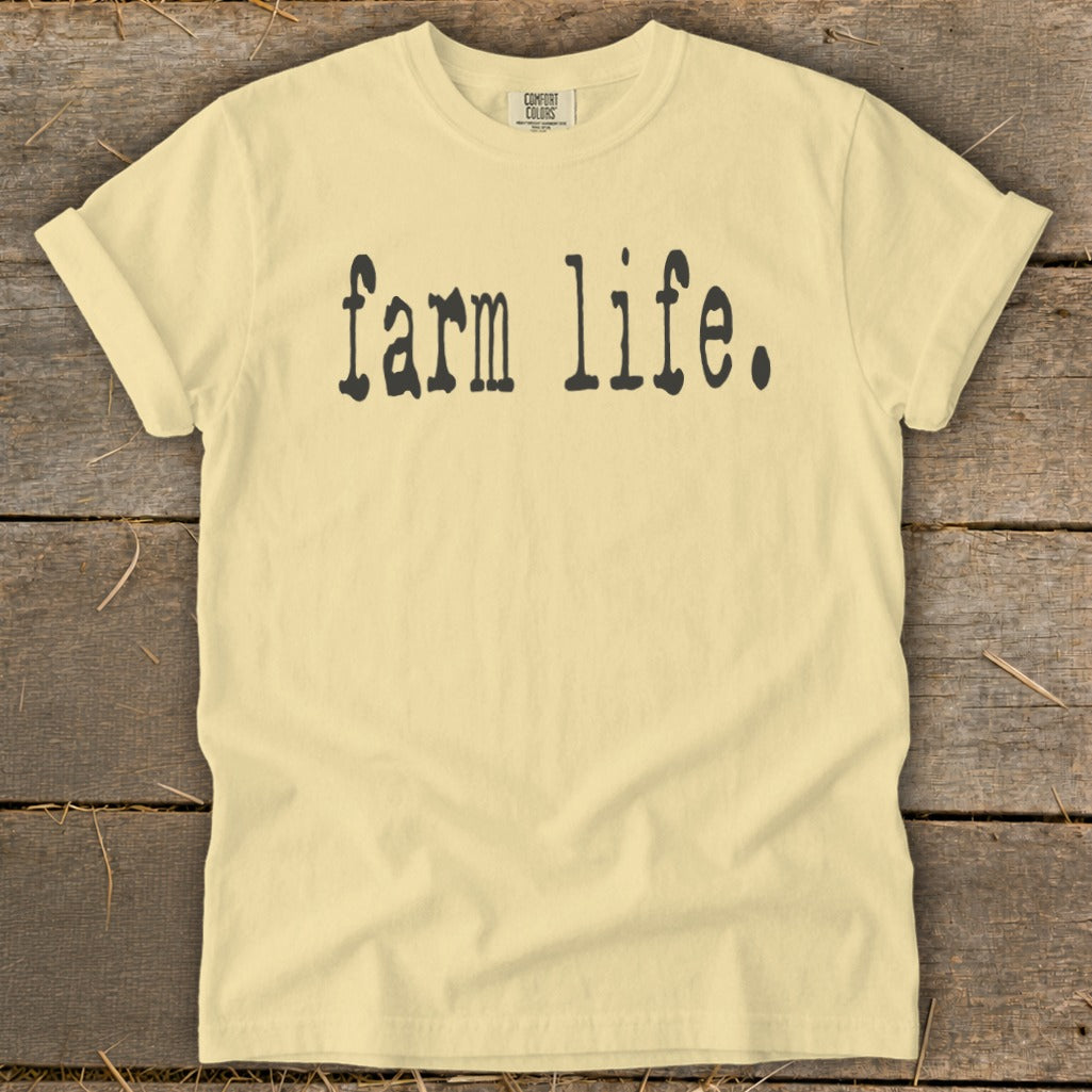 Light yellow t-shirt with black text reading "farm life."