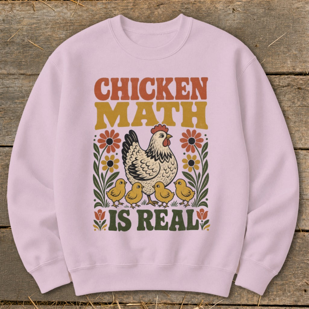 Pink sweatshirt with "CHICKEN MATH IS REAL" text and illustration of a hen with chicks.