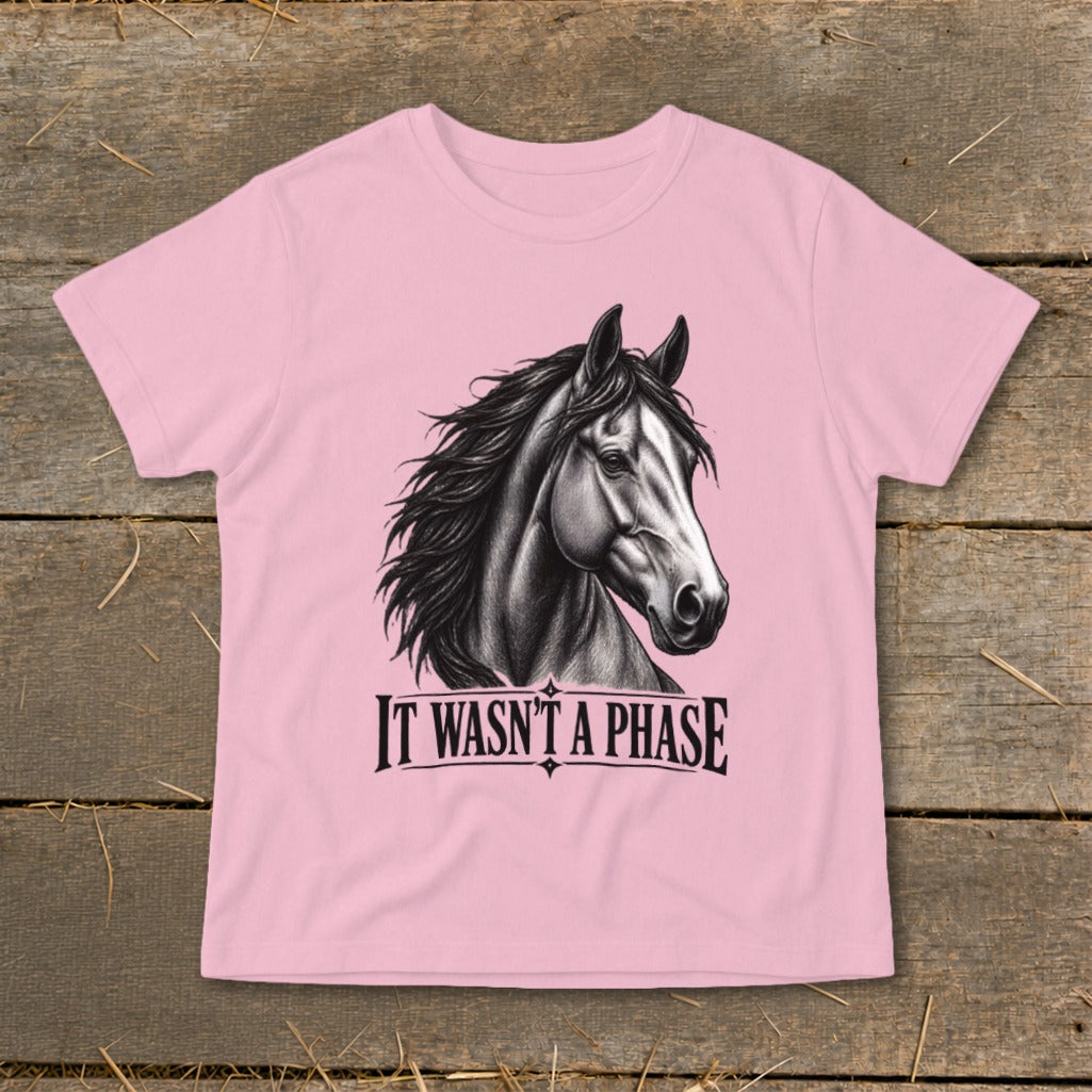 Pink t-shirt with a detailed sketch of a horse's head and the text "IT WASN'T A PHASE".