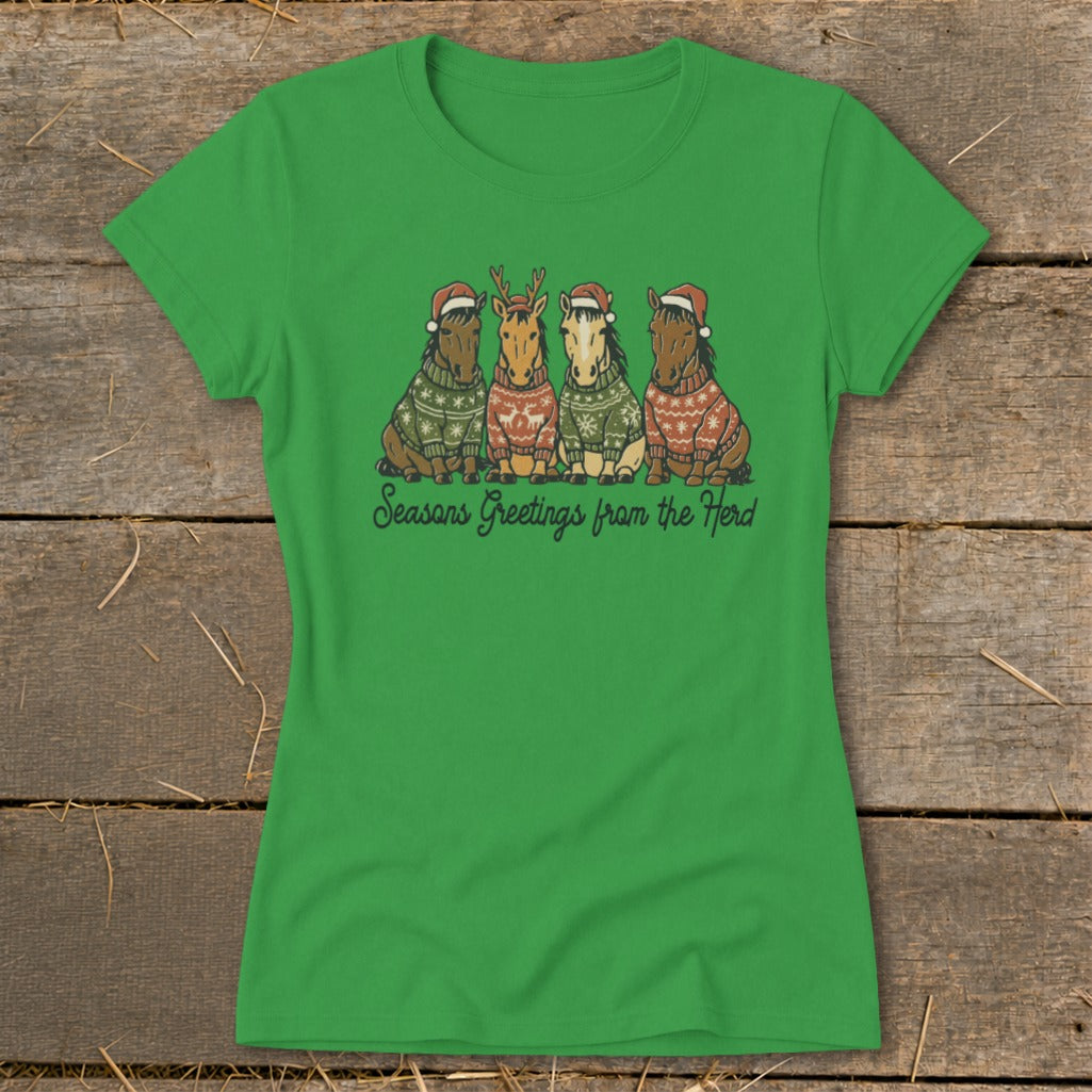 Green t-shirt with four cartoon horses wearing Santa hats and sweaters, with text "Seasons Greetings from the Herd".