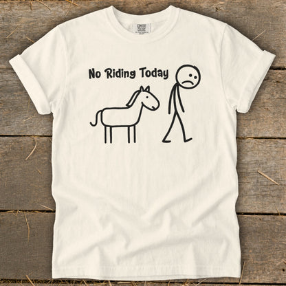 Cream t-shirt with black text "No Riding Today", a stick figure horse, and a sad stick figure.