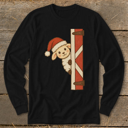 Cute sheep in Santa hat peeking around a red barn door on black shirt.