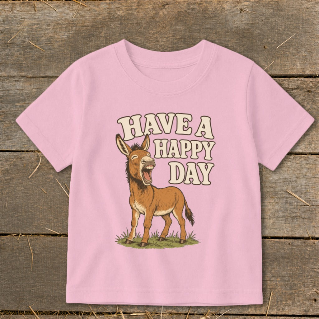 Pink t-shirt with a cartoon donkey and the text "HAVE A HAPPY DAY".