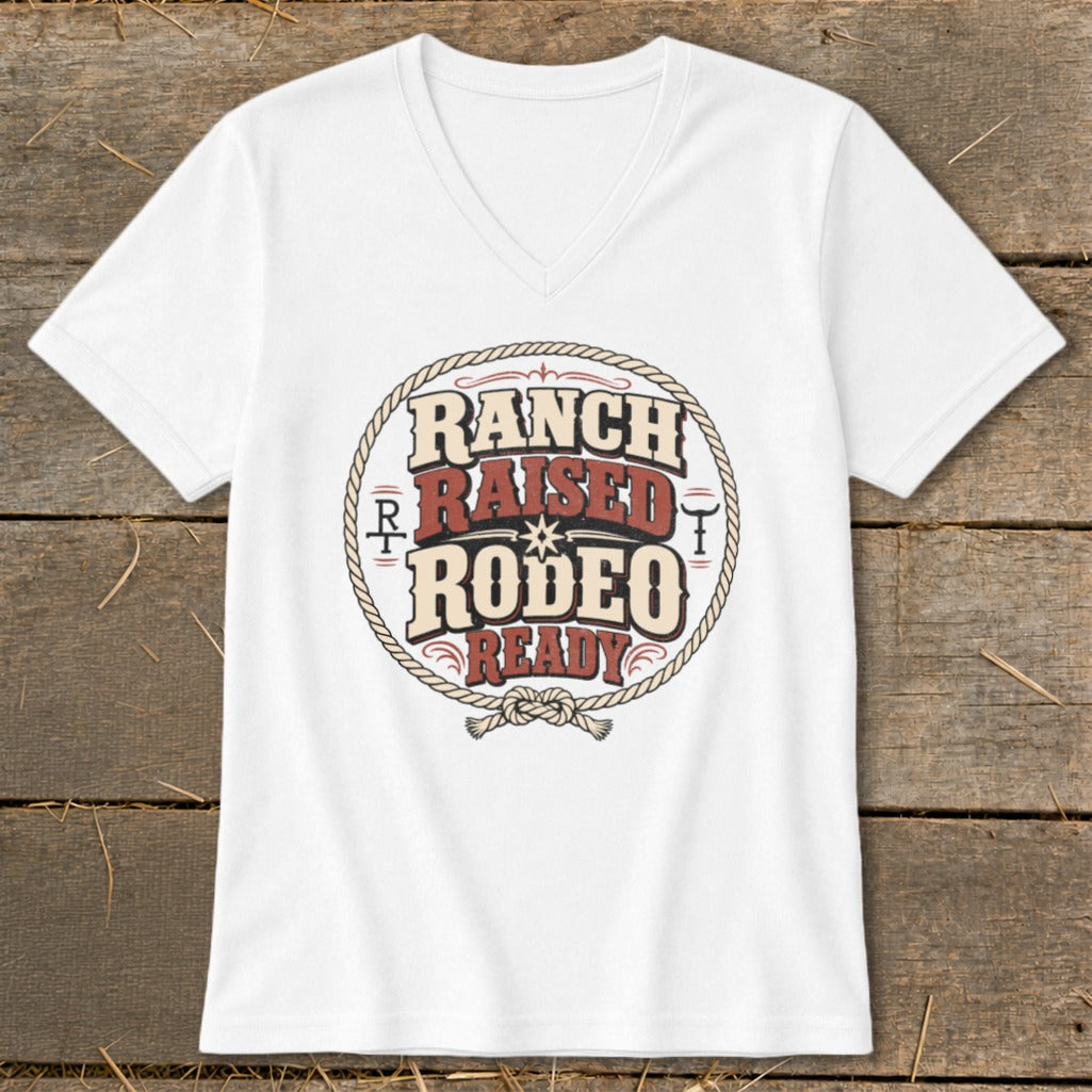 White v-neck t-shirt with "Ranch Raised Rodeo Ready" text and rope graphic.