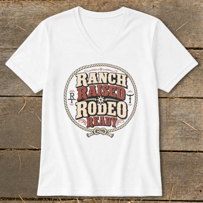 White v-neck t-shirt with "Ranch Raised Rodeo Ready" text and rope graphic.