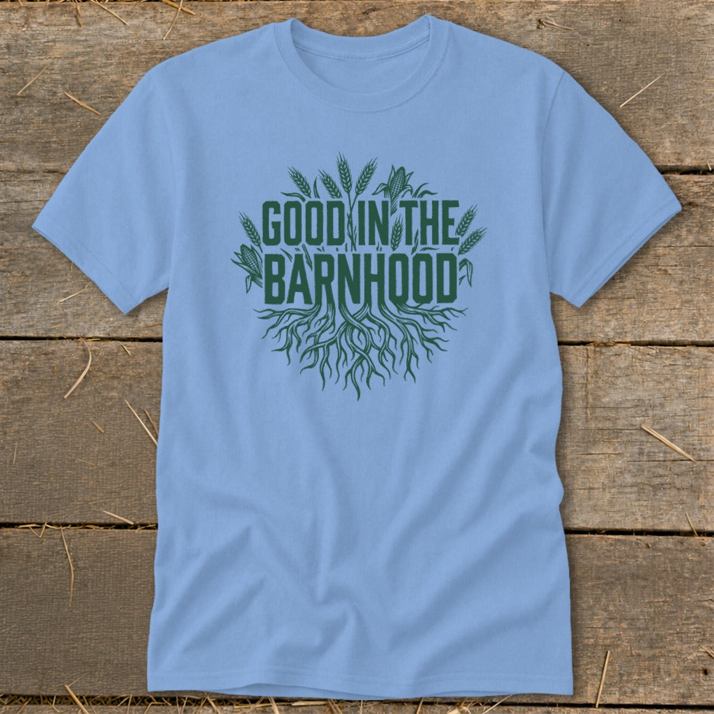 Light blue t-shirt with green "Good in the Barnhood" text and roots graphic.