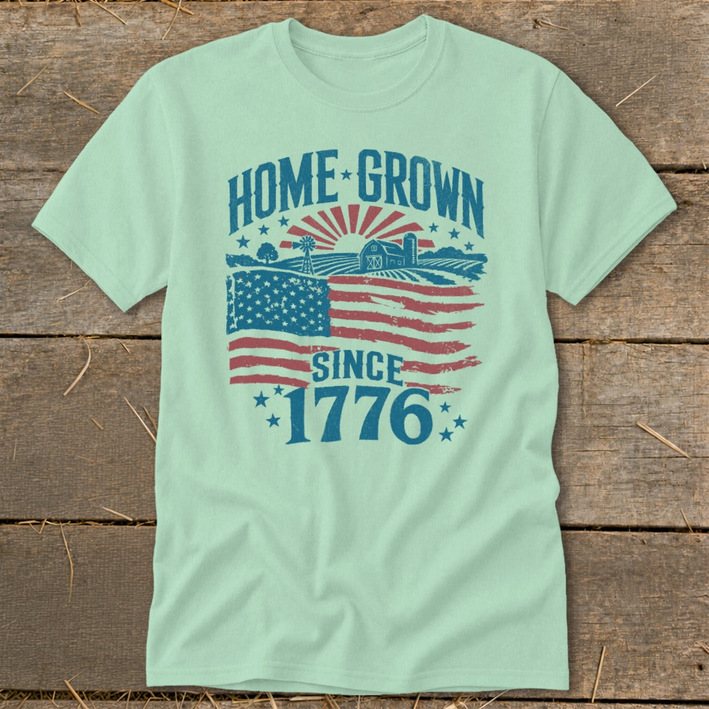 Light green t-shirt with "HOME GROWN SINCE 1776" text and distressed American flag graphic.