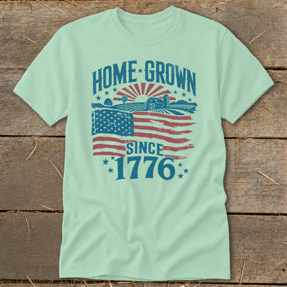 Light green t-shirt with "HOME GROWN SINCE 1776" text and distressed American flag graphic.