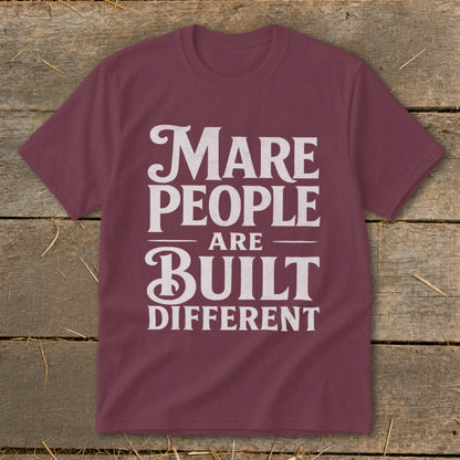 Maroon t-shirt with white text that reads "Mare People Are Built Different".