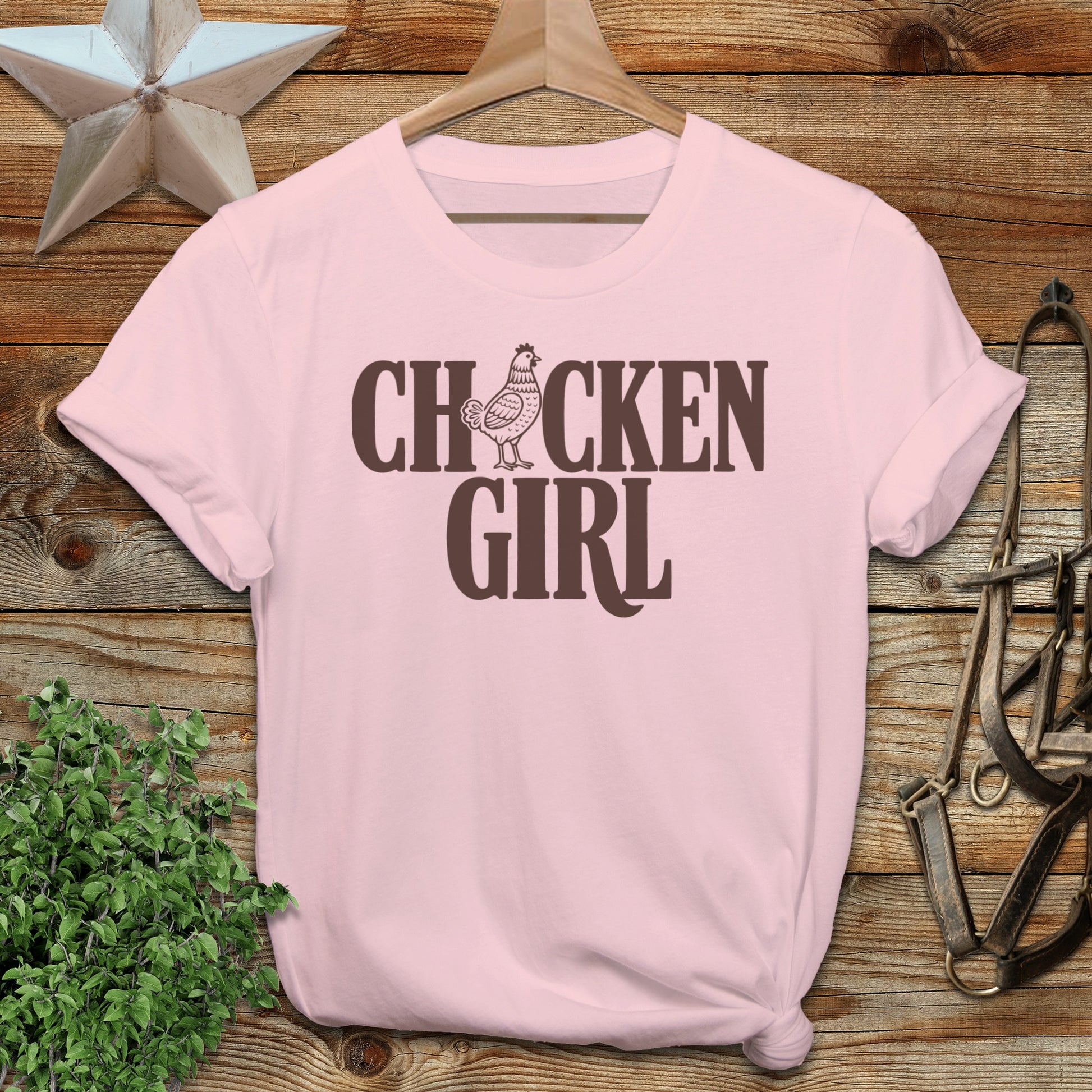 Pink t-shirt with brown "CHICKEN GIRL" text.