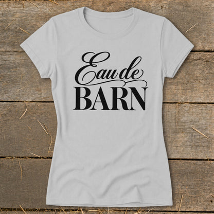 Light gray t-shirt with black text reading "Eau de BARN".