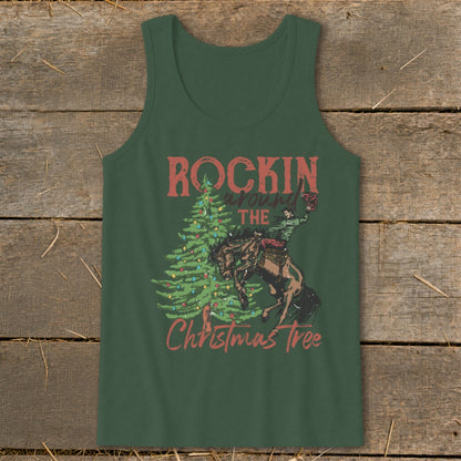 Green tank top with "Rockin around the Christmas tree" text and cowboy on bucking horse.