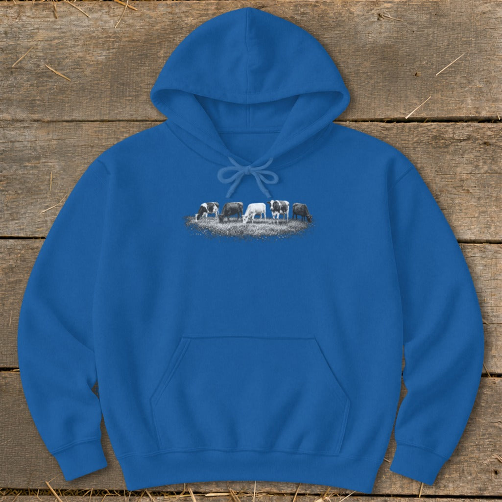 Blue hoodie with a line of grazing cows printed on the chest.
