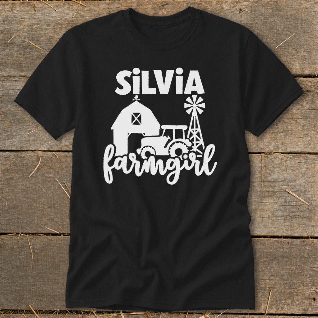 Black t-shirt with "Silvia farmgirl" text and farming graphic.