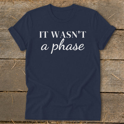 Navy t-shirt with white text "IT WASN'T a phase".