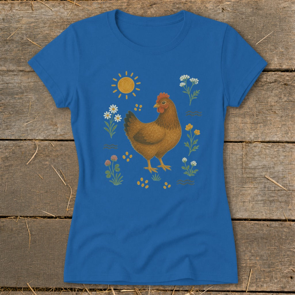 Blue t-shirt with a brown hen, sun, and wildflowers illustration.