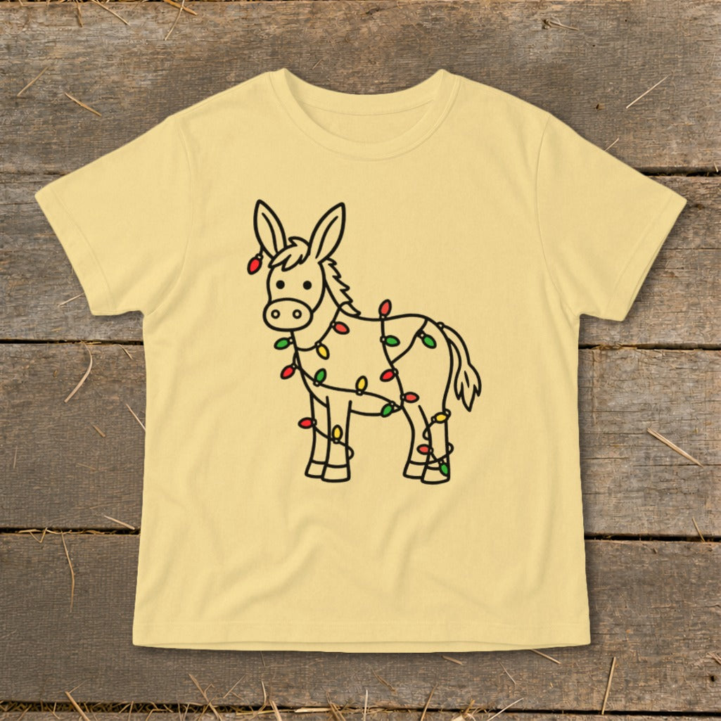 Light yellow t-shirt with a black outline drawing of a donkey wrapped in colorful Christmas lights.