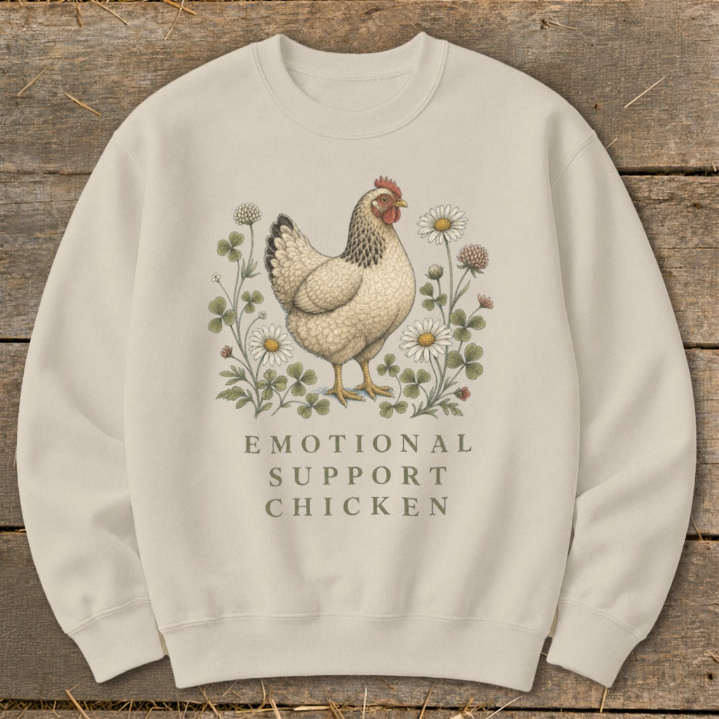 Cream sweatshirt with a vintage hen illustration and "Emotional Support Chicken" text.