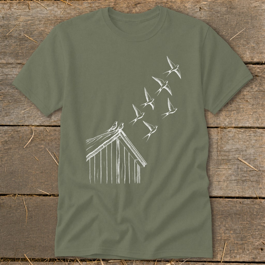 Olive green t-shirt featuring a white line drawing of a barn with birds flying upward.