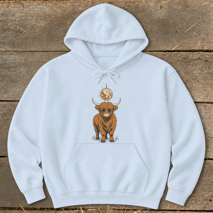 Light blue hoodie with a Highland cow wearing sunglasses and a disco ball graphic.