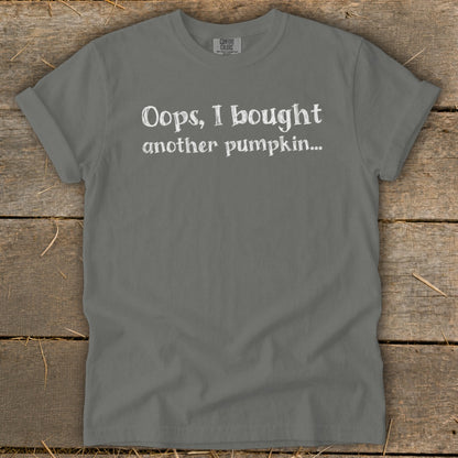 Gray t-shirt with white text that reads "Oops, I bought another pumpkin...".