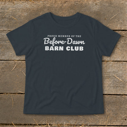 Dark t-shirt with white text: "Proud Member of the Before-Dawn Barn Club."