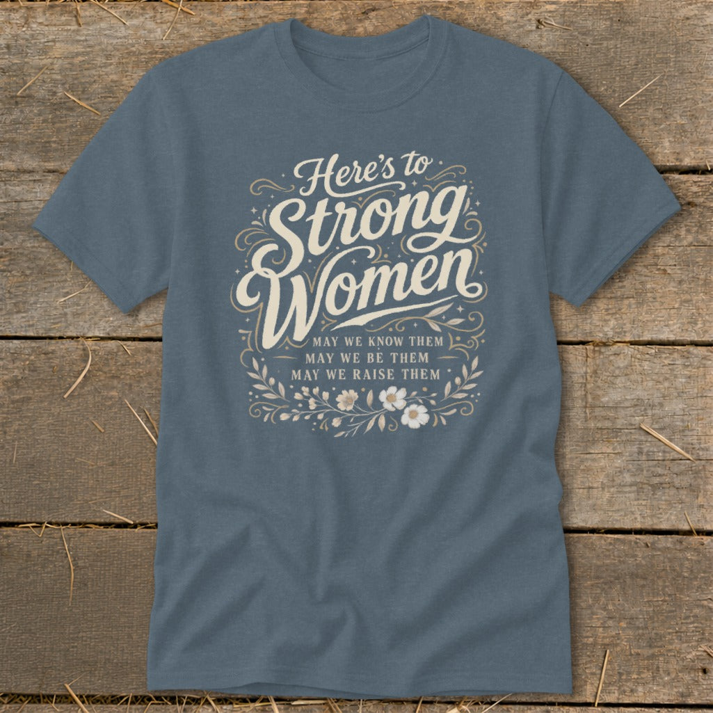 Blue t-shirt with "Here's to Strong Women" and quote.