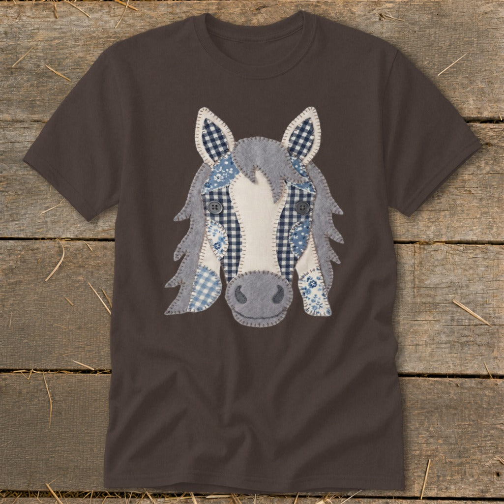 Brown t-shirt with a patchwork horse face appliqué in blue and white fabrics.