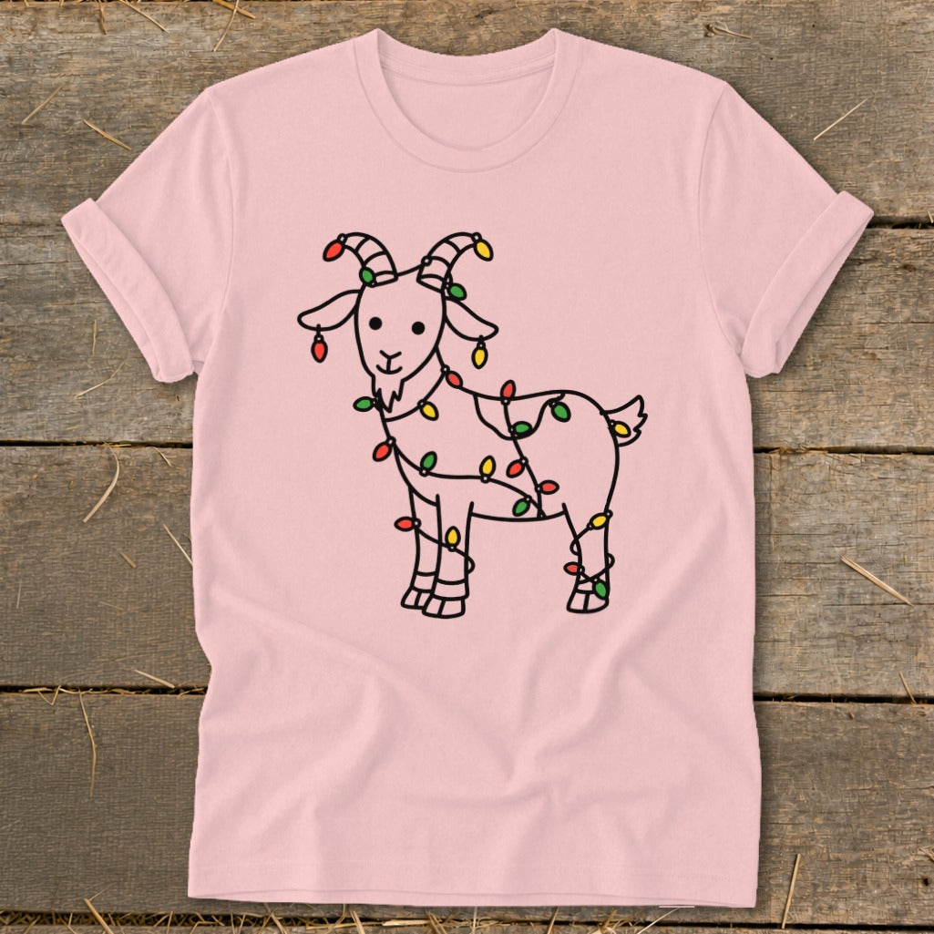 Pink t-shirt with a line drawing of a goat wrapped in colorful Christmas lights.