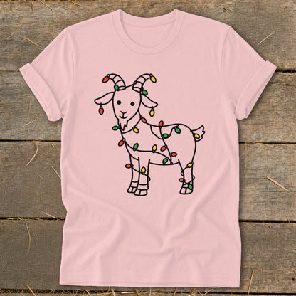 Pink t-shirt with a line drawing of a goat wrapped in colorful Christmas lights.
