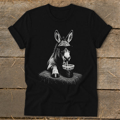 Donkey wearing sunglasses drinks from a cup with a straw, printed on a black t-shirt.