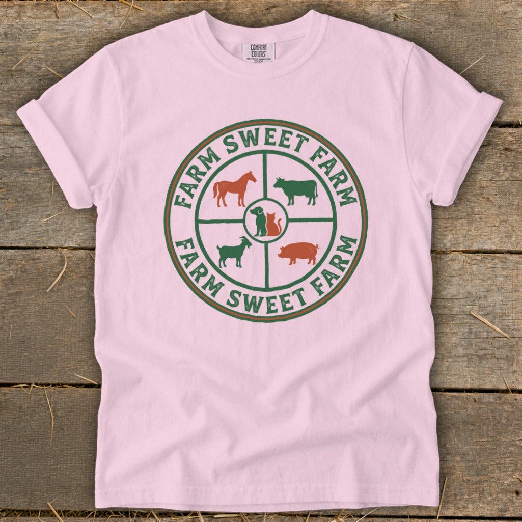 Pink t-shirt with "Farm Sweet Farm" circular graphic of farm animals.
