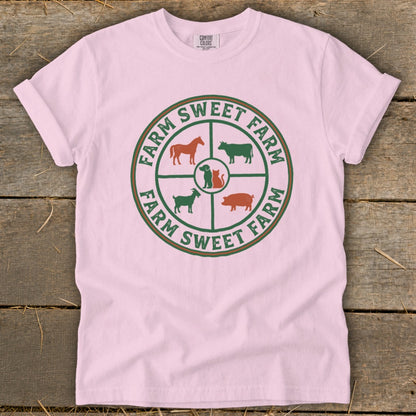 Pink t-shirt with "Farm Sweet Farm" circular graphic of farm animals.