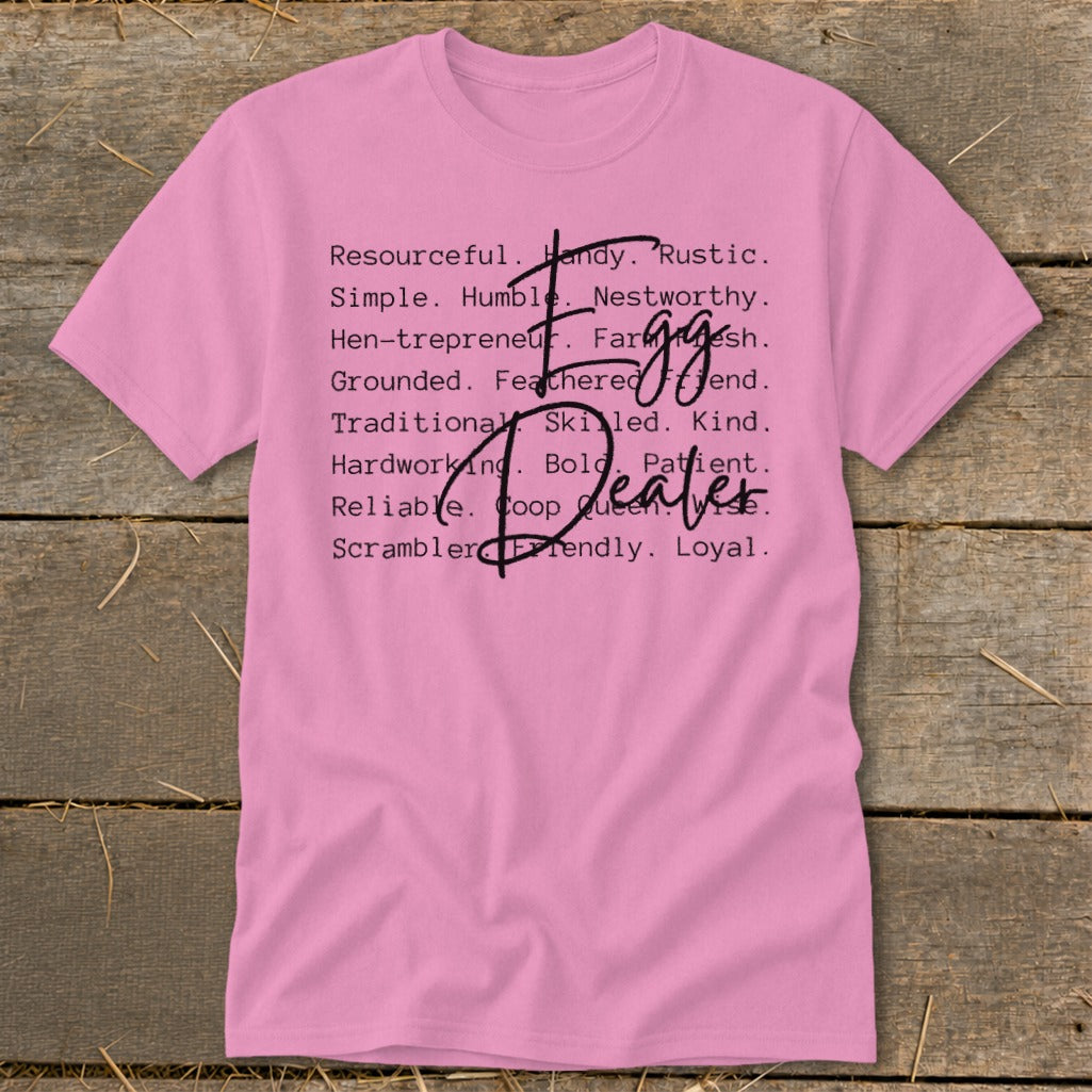 Pink t-shirt with list of words and "Egg Dealer" graphic.