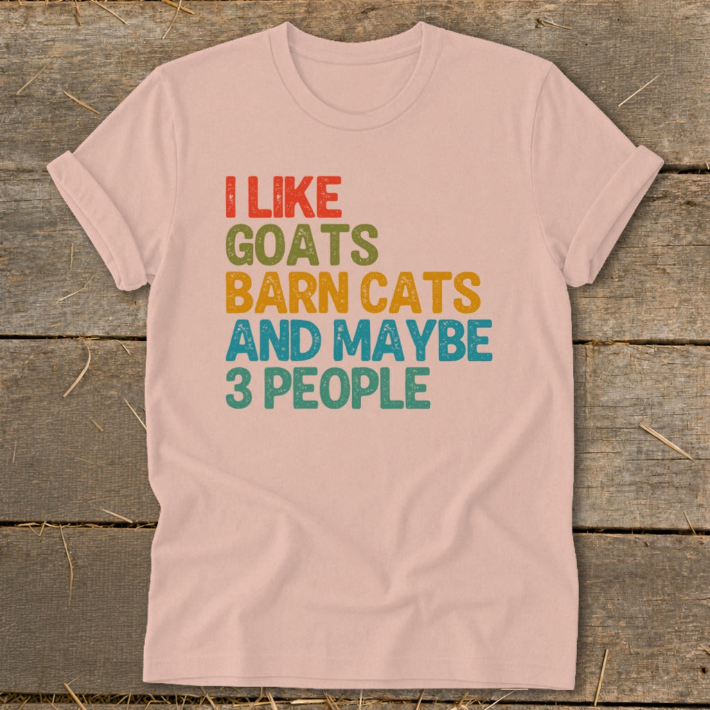 Pink t-shirt with text "I LIKE GOATS BARN CATS AND MAYBE 3 PEOPLE".