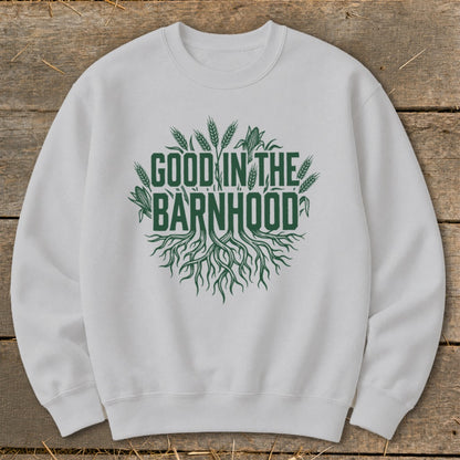 White sweatshirt with green text "GOOD IN THE BARNHOOD" and farm imagery.