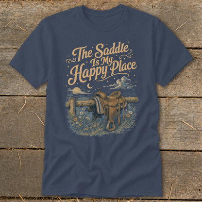 T-shirt graphic with saddle on fence and text "The Saddle Is My Happy Place".