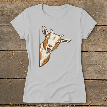 Light grey t-shirt with illustration of a smiling goat peeking around a corner.