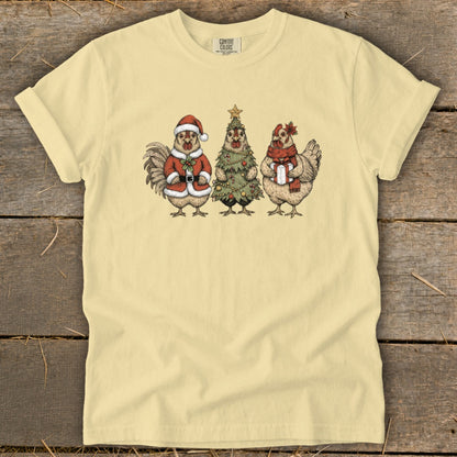 Rooster in Santa suit, Christmas tree, and chicken with gift on a yellow t-shirt.