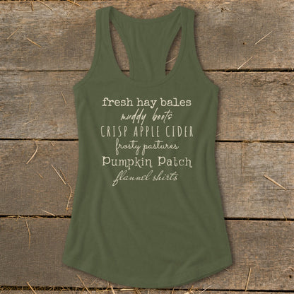 Olive green tank top with white text listing fall activities and items.