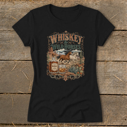 Black t-shirt with "Whiskey & Wild Horses" graphic featuring horses, whiskey bottle, and desert landscape.