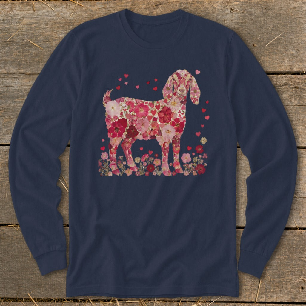 Goat silhouette filled with pink and red flowers and hearts on a navy long-sleeve shirt.