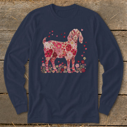 Goat silhouette filled with pink and red flowers and hearts on a navy long-sleeve shirt.