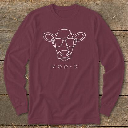 Maroon long sleeve shirt with white line art cow wearing glasses and text "MOO-D".